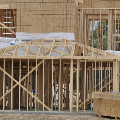 house-being-framed-timber-framing